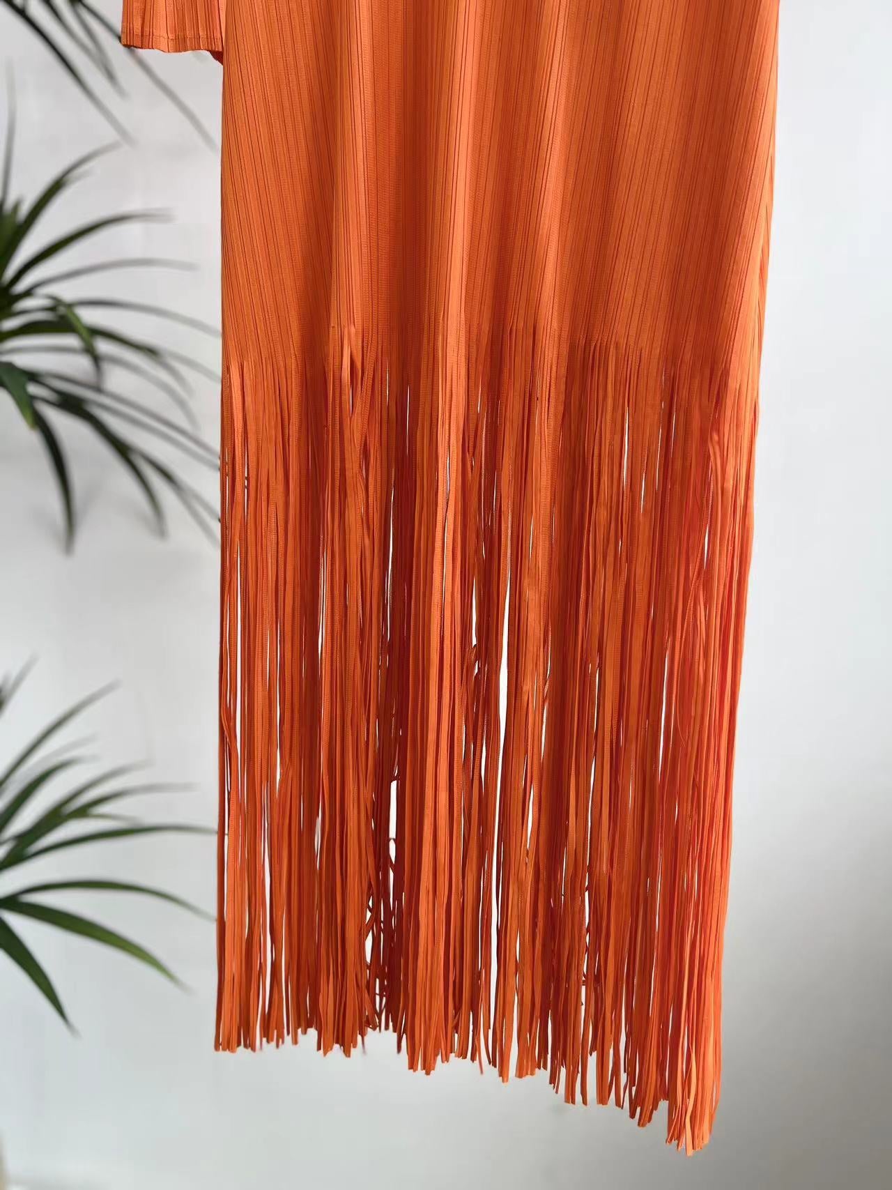 Pre Order:  Orange Tassel Pleated Dress