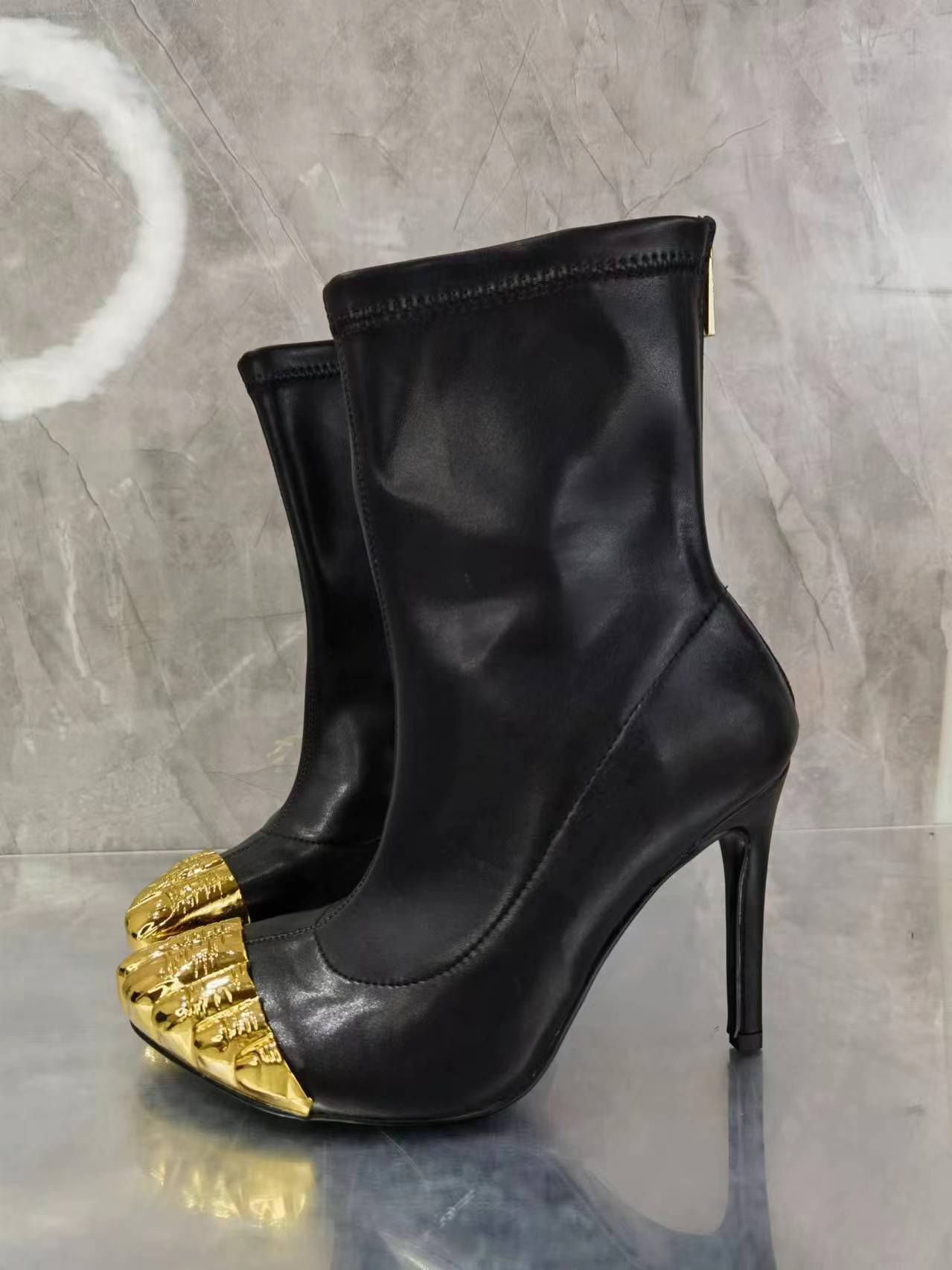 Black and shops gold boot